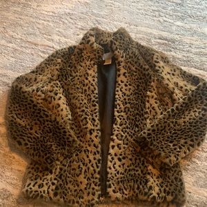 This is a white stag cheetah fur jacket